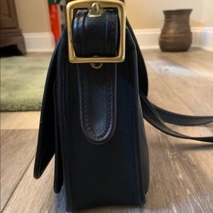 Signature Coach crossbody purse